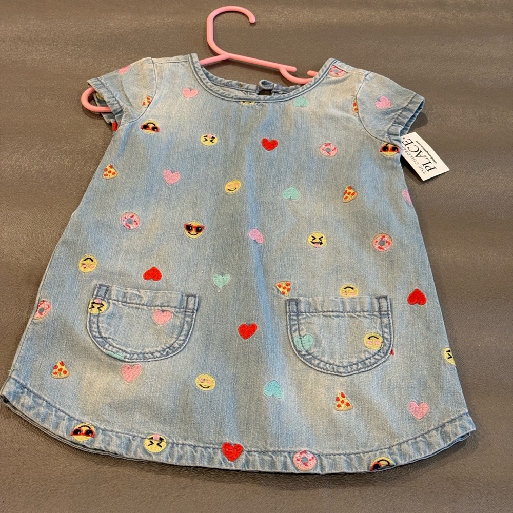 The Children’s Place  Embroidered Denim Dress with Emoji and Heart Patterns.